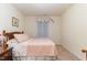 Cozy bedroom featuring a single bed and neutral decor at 1600 Frog Hollow Way, Wake Forest, NC 27587