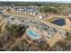 Aerial view of a community pool and clubhouse, offering residents a resort-style living experience at 1713 Wrenn Rd, Durham, NC 27703