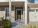 Charming front entrance with wreath, sidelight, and landscaping, enhancing curb appeal at 1713 Wrenn Rd, Durham, NC 27703