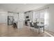 Open-concept kitchen and dining area with modern appliances and ample natural light at 1713 Wrenn Rd, Durham, NC 27703
