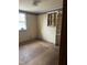 Basic bedroom with natural light from two windows and space for new furniture at 186 Frank Cash Rd, Timberlake, NC 27583