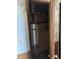 The closet features a rod, shelving, wallpaper remnants, and wood paneling at 186 Frank Cash Rd, Timberlake, NC 27583