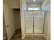 Bathroom showcasing glass shower with built-in shelves and a closet at 192 Bruce Dr, Dunn, NC 28334