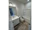 Clean bathroom features a shower-tub combo, a toilet, and a vanity at 192 Bruce Dr, Dunn, NC 28334