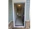 View of the home's entryway showcasing light gray vinyl flooring and white interior doors at 192 Bruce Dr, Dunn, NC 28334