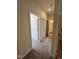 Hallway view showcasing access to rooms and bathroom at 192 Bruce Dr, Dunn, NC 28334