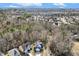 Wide aerial shot of the community, showcasing the home's location amongst trees and residential streets at 201 Timber Meadow Lk, Fuquay Varina, NC 27526