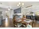 View of kitchen, dining and living rooms creating a large open floorplan in the home at 201 Timber Meadow Lk, Fuquay Varina, NC 27526