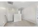 Upstairs hallway with neutral carpet and walls at 201 Timber Meadow Lk, Fuquay Varina, NC 27526