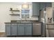 Well-lit kitchen featuring stainless steel appliances, updated countertops, and white subway tile backsplash at 201 Timber Meadow Lk, Fuquay Varina, NC 27526