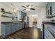 Modern kitchen with stainless steel appliances, subway tile backsplash, and seamless connection to dining area at 201 Timber Meadow Lk, Fuquay Varina, NC 27526