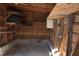 Wood paneled shed interior with shelving at 2110 Carolina Mill Rd, Burlington, NC 27217