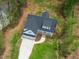 Aerial view of house with a covered porch, a two-car garage and a walkway at 215 Purslane Dr, Franklinton, NC 27525
