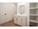 Bathroom vanity features quartz countertop, modern fixtures, and built in shelving at 215 Purslane Dr, Franklinton, NC 27525