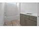 Bathroom with tub and vanity, offering modern fixtures and finishes at 215 Purslane Dr, Franklinton, NC 27525