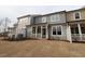Backyard view featuring the home's exterior and a screened-in porch at 2454 Englemann Dr # 380, New Hill, NC 27562