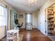 Bedroom with a light and airy feel with play area and decorative cabinet at 2521 St Mary'S St, Raleigh, NC 27609
