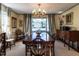 Elegant dining room with a large table and ornate chandelier for memorable gatherings at 2521 St Mary'S St, Raleigh, NC 27609