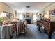 Cozy living room with elegant furnishings, a fireplace, and large windows for abundant light at 2521 St Mary'S St, Raleigh, NC 27609