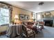 Charming living room featuring a fireplace, floral accents, and comfortable seating at 2521 St Mary'S St, Raleigh, NC 27609