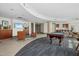 Spacious common area featuring comfortable seating, a pool table, and kitchenette, perfect for relaxation and socializing at 301 Fayettville St # 2908, Raleigh, NC 27601