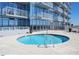 Upscale community pool surrounded by modern architecture with inviting balconies, perfect for luxury living at 301 Fayettville St # 2908, Raleigh, NC 27601