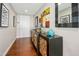 Stylish hallway with hardwood floors and designer decor at 301 Fayettville St # 2908, Raleigh, NC 27601