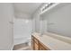 Neutral bathroom featuring wooden cabinets and a combined shower-tub at 3100 Cynthiana Ct, Raleigh, NC 27610