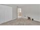 View of an empty bedroom featuring carpet and a view to the second floor at 3100 Cynthiana Ct, Raleigh, NC 27610