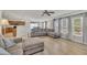Open-concept living room flows into the kitchen, offering a comfortable seating area and modern design at 3100 Cynthiana Ct, Raleigh, NC 27610