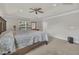 Spacious main bedroom with neutral walls and ceiling fan, promoting a calming ambiance at 3100 Cynthiana Ct, Raleigh, NC 27610