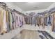 Spacious walk-in closet with ample shelving and hanging space for organized storage at 3100 Cynthiana Ct, Raleigh, NC 27610
