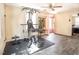 Exercise room equipped with workout equipment, natural light, and a view to another room at 3130 State Hwy 58, Louisburg, NC 27549