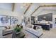 Open-concept living area with vaulted ceilings, exposed beams, and contemporary furnishings at 33 Henry Ct, Chapel Hill, NC 27516