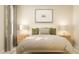 Beautiful bedroom with a cozy bed, soft lighting, and serene ambiance at 3725 Massey Pond Trl, Raleigh, NC 27616