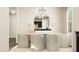 Inviting dining room with a modern table, comfortable seating, stylish mirror, and contemporary lighting at 3725 Massey Pond Trl, Raleigh, NC 27616