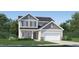 Charming two-story home showcasing stone accents, neutral siding, and an attached two-car garage at 3725 Massey Pond Trl, Raleigh, NC 27616