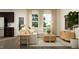 Cozy living room featuring a sectional sofa, stylish coffee table, and large windows providing natural light at 3725 Massey Pond Trl, Raleigh, NC 27616