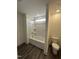 Bathroom with a bathtub/shower combo and toilet at 405 Rising Star Dr, Clayton, NC 27520