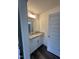 Bathroom features a vanity with granite countertop and ample storage space at 405 Rising Star Dr, Clayton, NC 27520