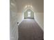 Finished bonus room with plush carpet and window at 405 Rising Star Dr, Clayton, NC 27520