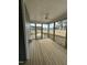 Enclosed porch with ceiling fan, offering serene views and a seamless blend of indoor and outdoor living at 405 Rising Star Dr, Clayton, NC 27520