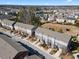 Neighborhood aerial view featuring multi-story townhomes with mature trees and landscaping throughout at 4116 Sykes St, Cary, NC 27519