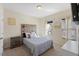 Inviting bedroom featuring a cozy bed, natural light, and neutral decor at 4116 Sykes St, Cary, NC 27519