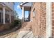 Brick stairs lead up to the entrance of this townhome, showcasing the exterior architectural details at 4116 Sykes St, Cary, NC 27519