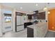 Beautiful kitchen featuring stainless steel appliances, granite countertops, and bar stool seating at 4116 Sykes St, Cary, NC 27519