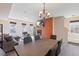 Open-concept living room and dining area with modern furnishings and neutral colors at 4116 Sykes St, Cary, NC 27519