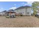 Large backyard featuring a gazebo and a deck for outdoor enjoyment at 505 Redford Place Dr, Rolesville, NC 27571