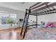 Bedroom with lofted bed and desk area with a window at 505 Redford Place Dr, Rolesville, NC 27571