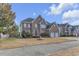 Two-story brick home with two-car garage and arched entryway on a dead-end street at 505 Redford Place Dr, Rolesville, NC 27571